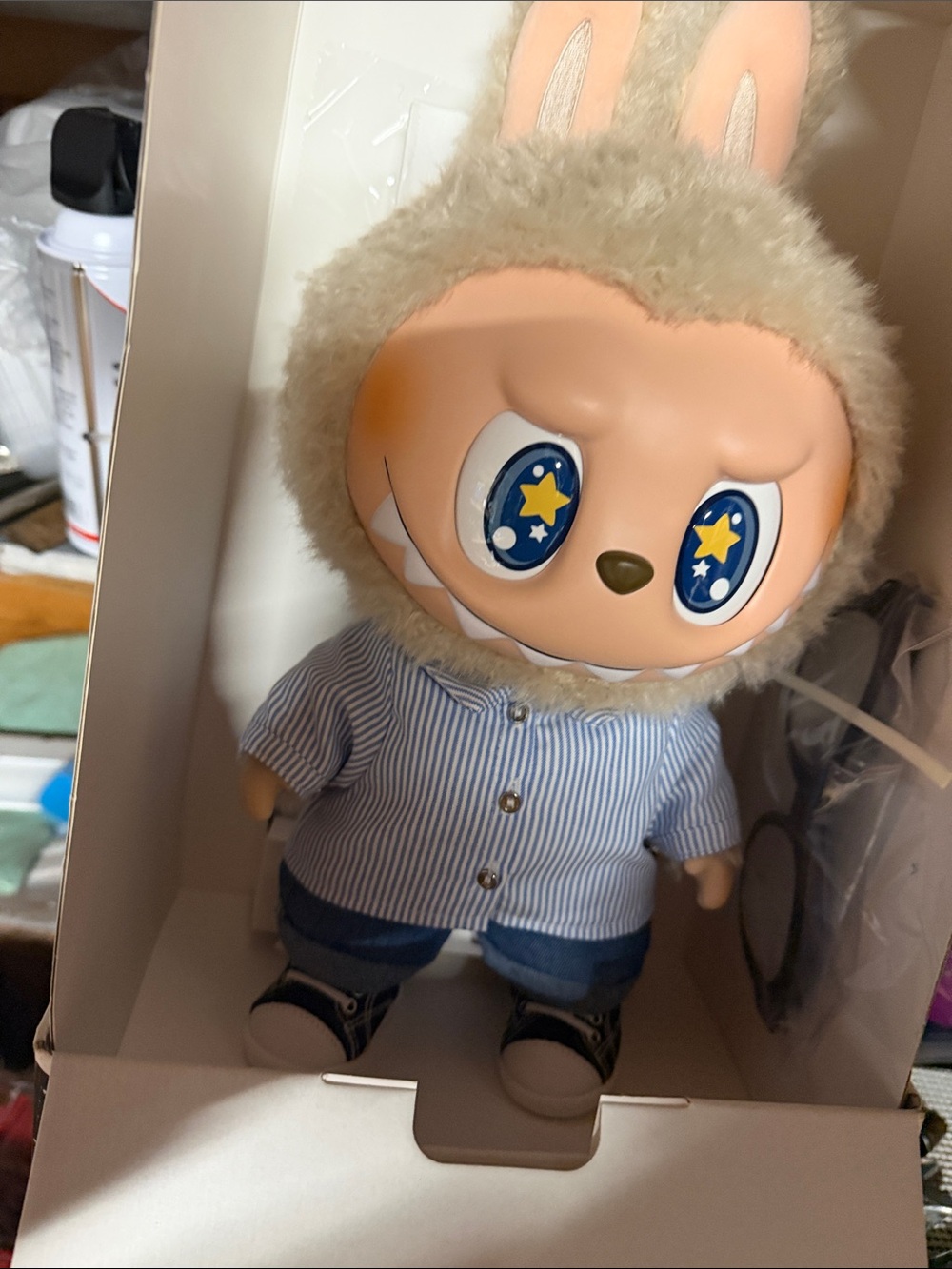 Star-Eyed Bunny Plush Doll in Cream Fur with Blue and white stripes Outfit.
